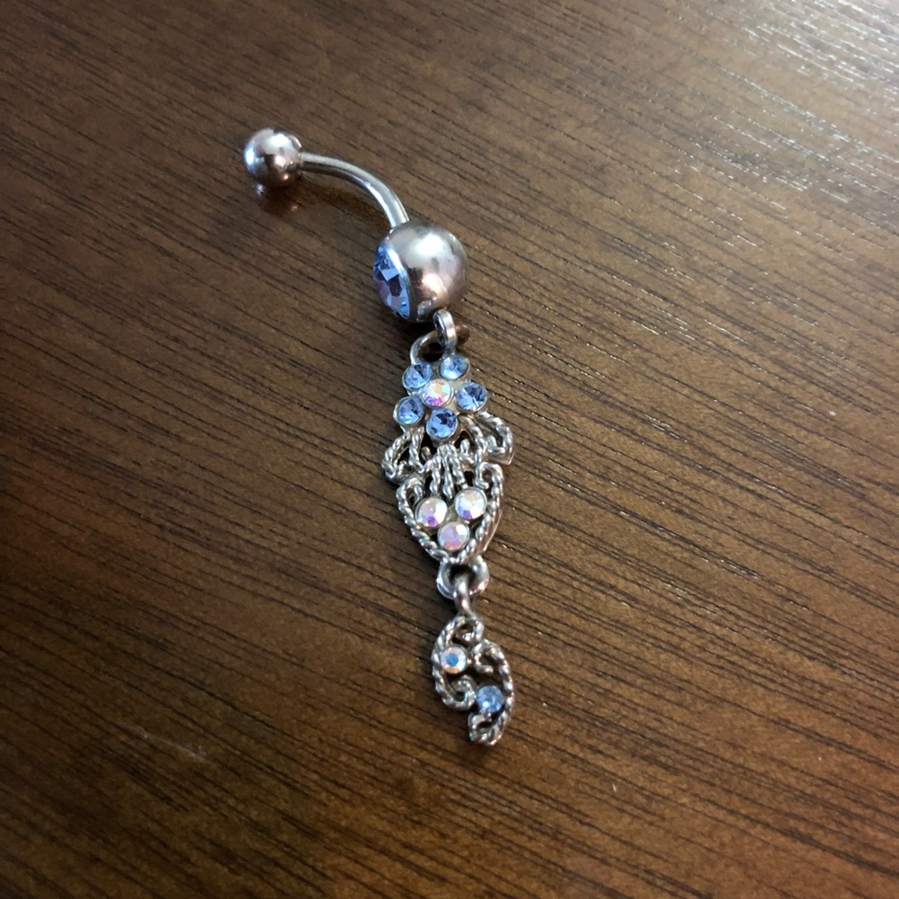 Piercing pagoda sterling silver dangling naval ring with blue gem stones